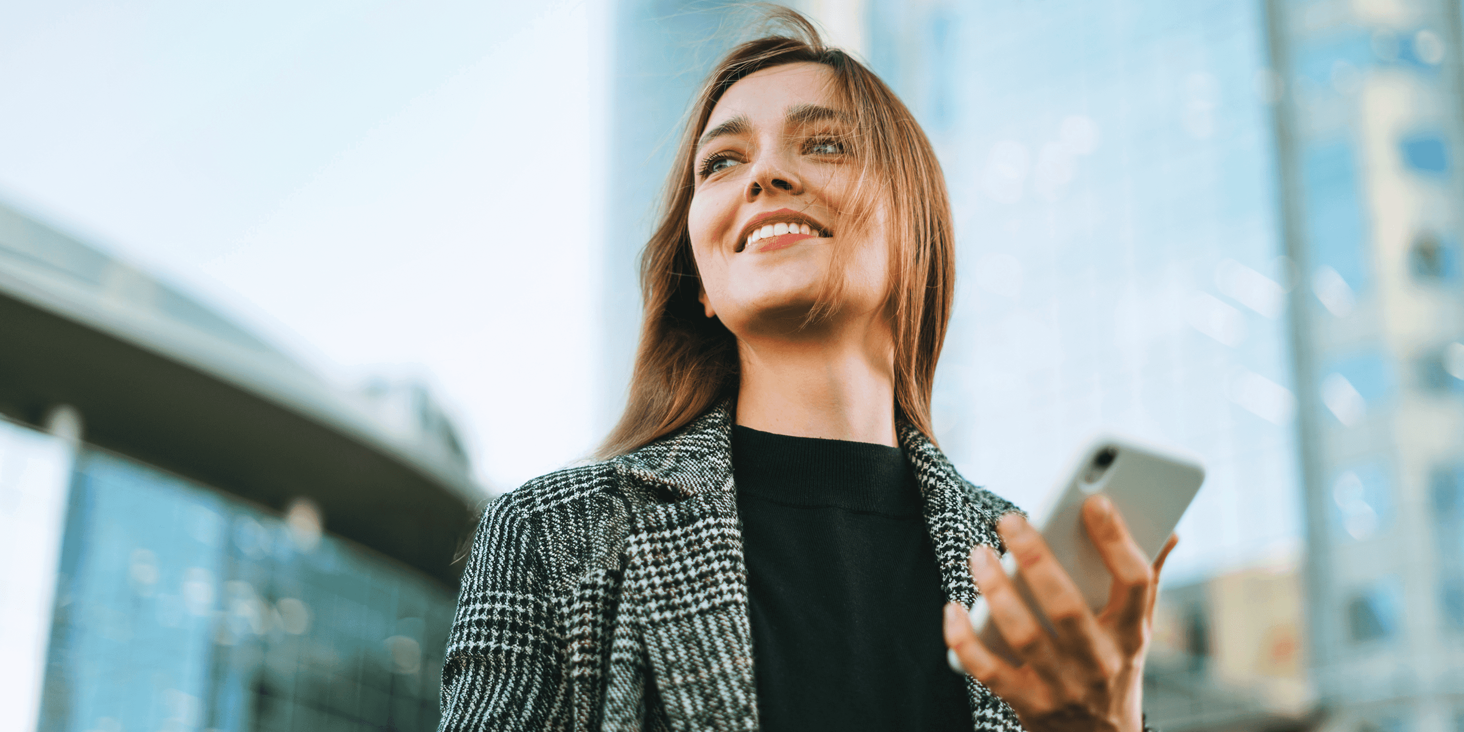 woman holding phone